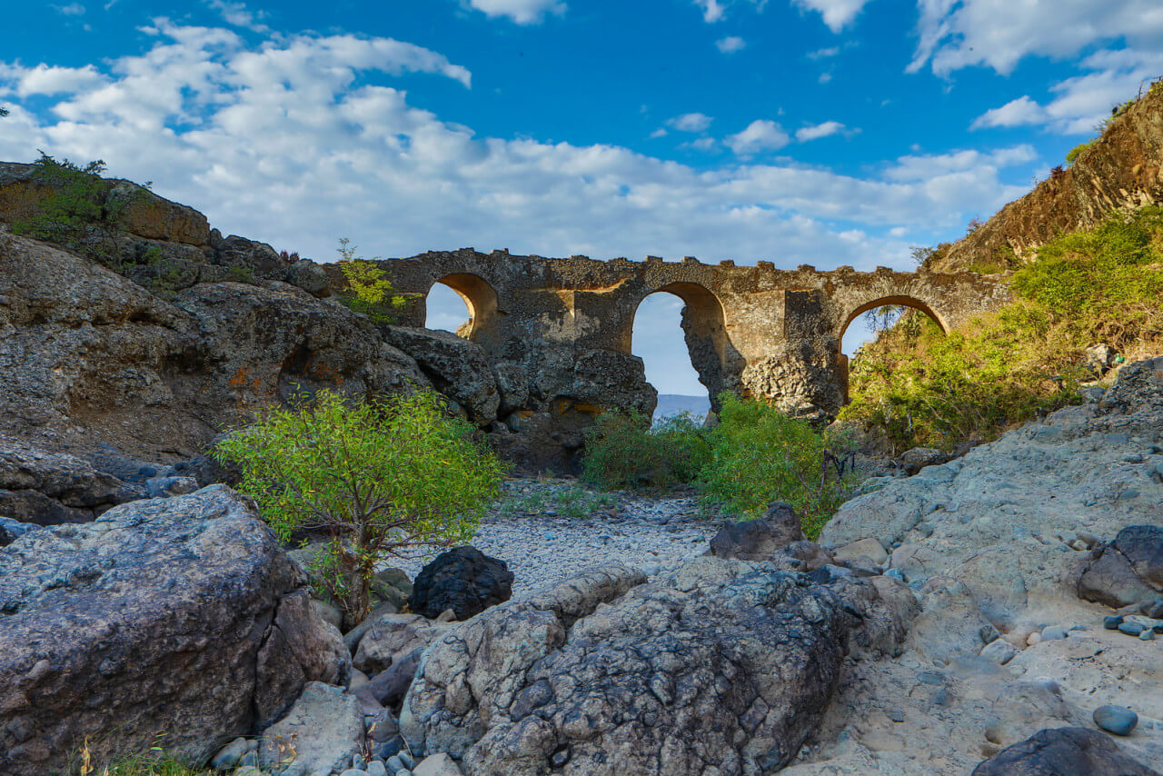 Landscape with stone arches